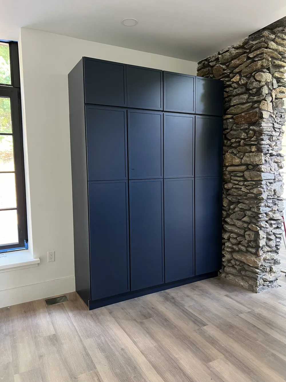 Floor-to-Ceiling Storage Wall, finish carpentry by SEGAL XVI